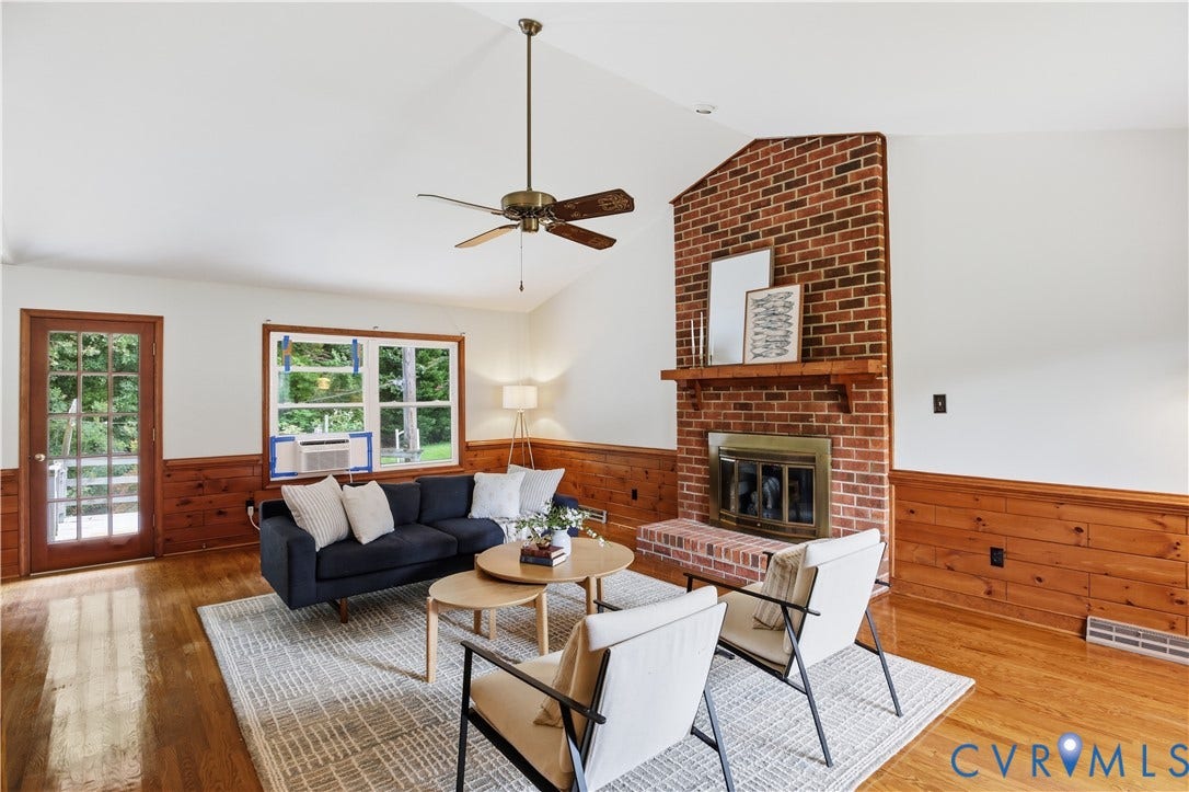 3231 Ludgate Road, Chester, VA 23831 Vaulted ceiling, ceiling fan, brick fireplace, wood mantel, and wood-finish flooring