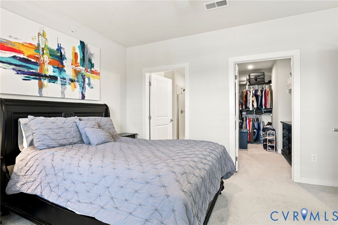 3900 Maze Runner Drive, #403, Midlothian, VA 23112 Plush carpeting, light wall tones, and a built-in closet system