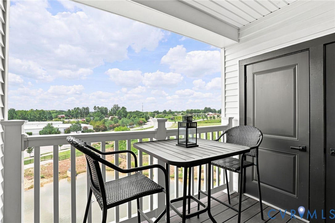 3900 Maze Runner Drive, #403, Midlothian, VA 23112 Outdoor balcony with dark wood-finish floorsflooring, and white exterior siding