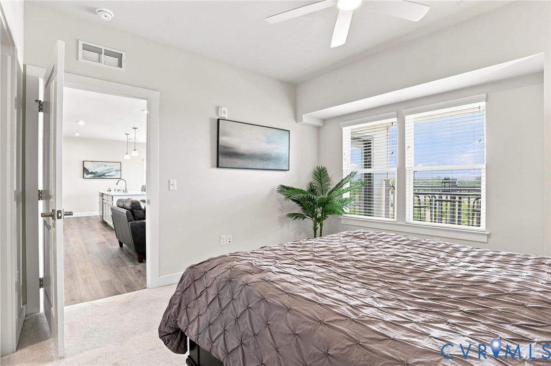 3900 Maze Runner Drive, #403, Midlothian, VA 23112 Recessed lighting, ceiling fan, two large windows with blinds, and white walls