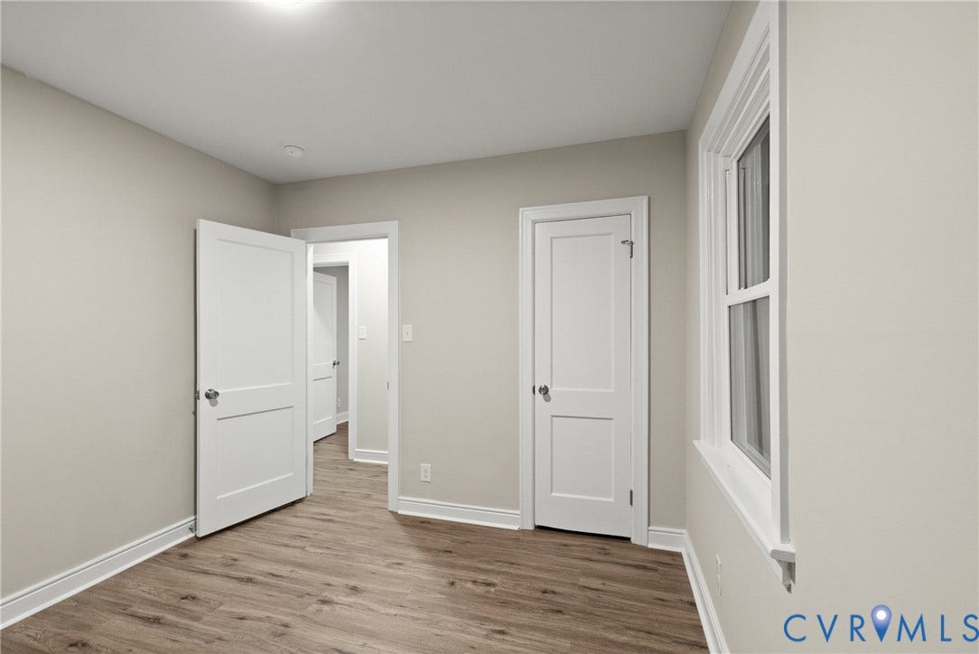 1500 Leicester Road, Cedarhurst - Westover Hills, Richmond, VA 23225 Wood-finish flooring, white trim, and neutral wall tones