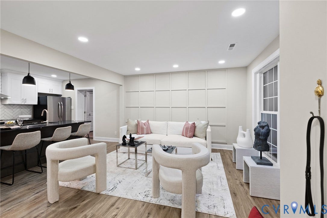 1500 Leicester Road, Cedarhurst - Westover Hills, Richmond, VA 23225 Open-concept living area featuring wood-finish flooring, recessed lighting, and a kitchen with white cabinetry and stainless steel appliances