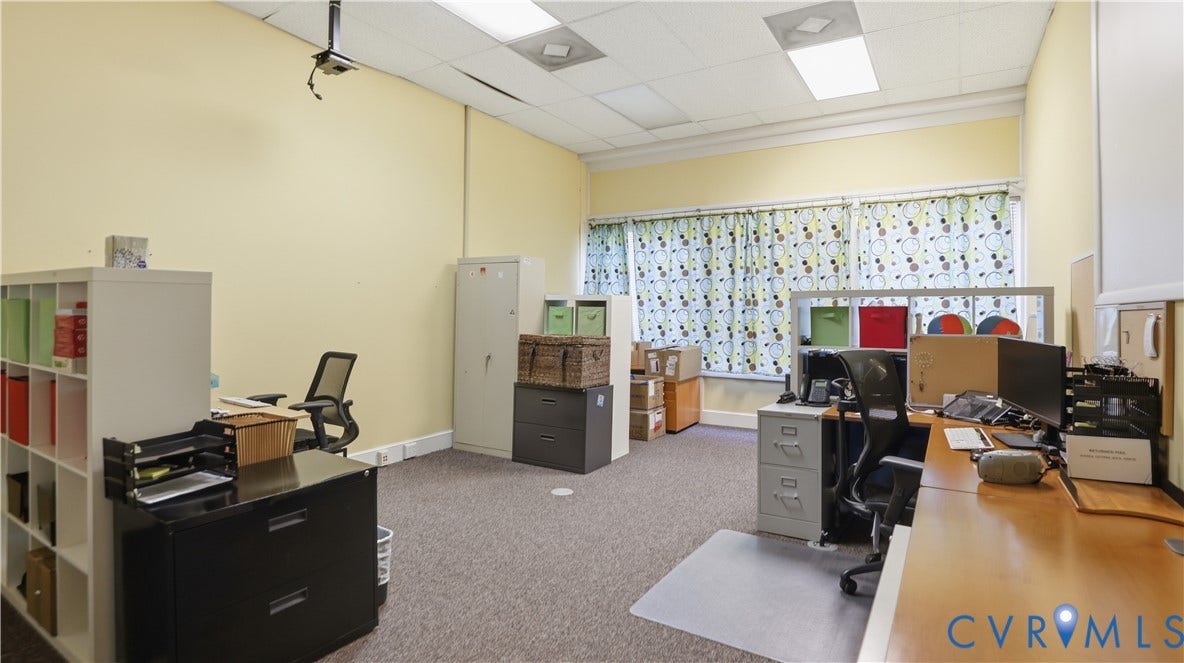 111 N 17th Street, Richmond, VA 23219 Recessed lighting, drop ceiling, wall-to-wall carpeting, and multiple windows