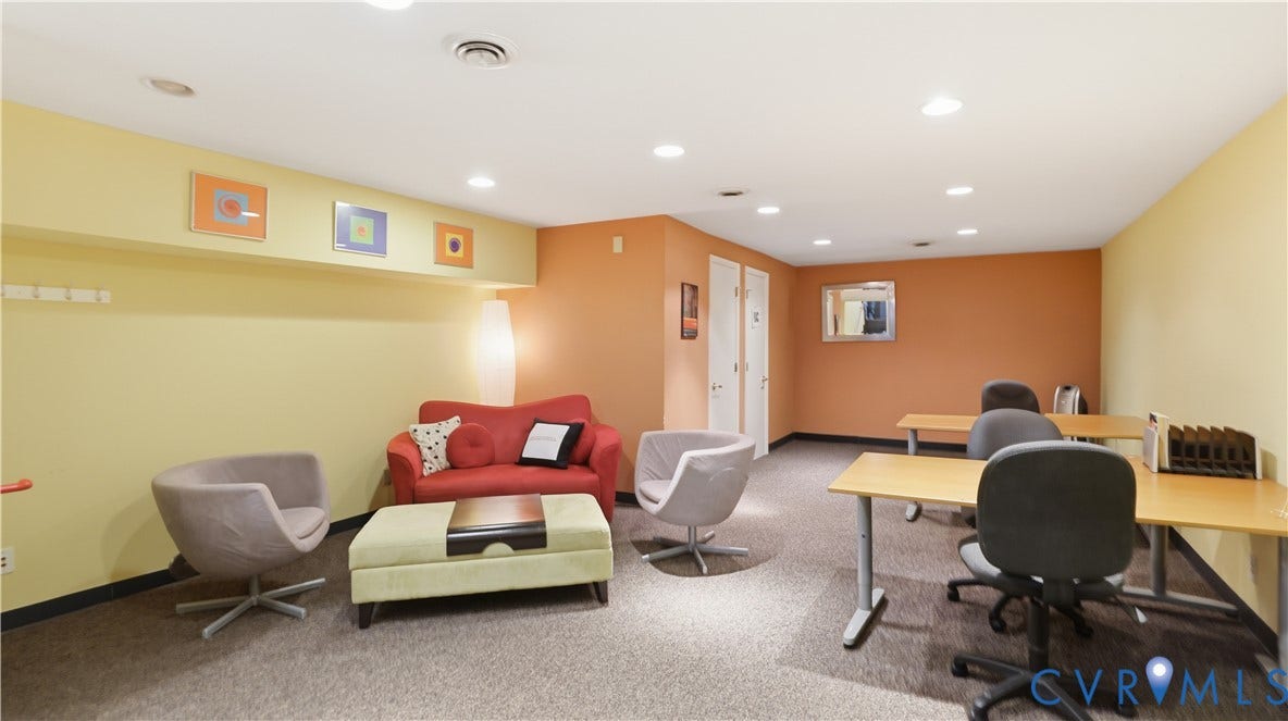 111 N 17th Street, Richmond, VA 23219 Recessed lighting throughout, carpeted flooring, two paneled doors, and a wall-mounted mirror