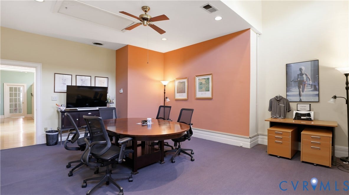 111 N 17th Street, Richmond, VA 23219 Recessed lighting, wood-finish ceiling fan, wood-finish flooring, white trim, and a built-in wall niche