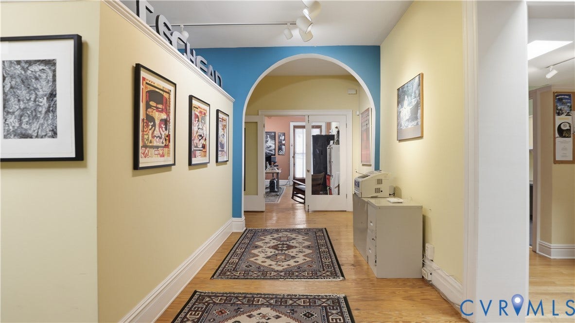 111 N 17th Street, Richmond, VA 23219 Hardwood-finish flooring, arched doorway, and track lighting