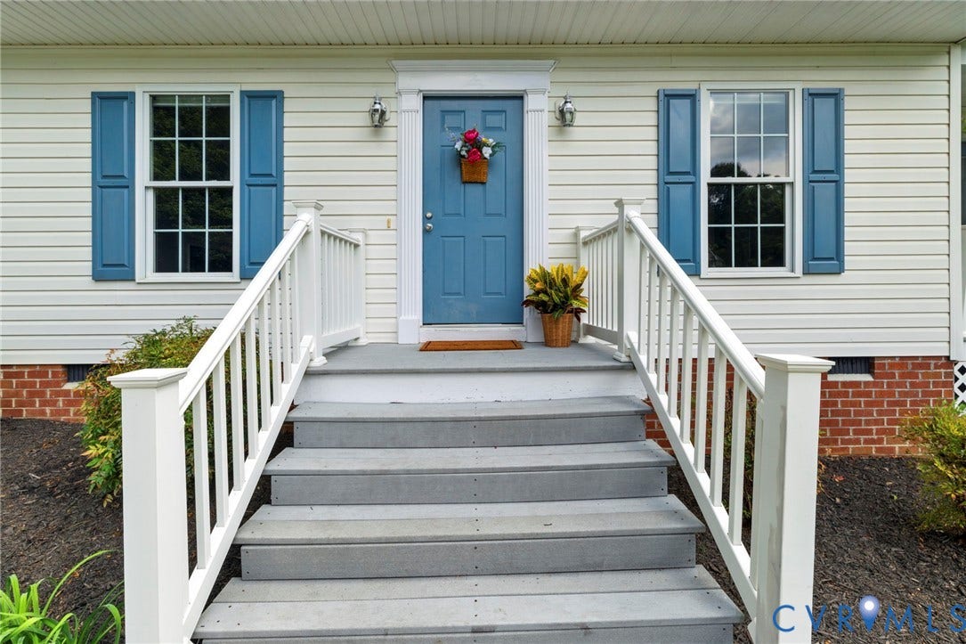 6201 Cameron Bay Terrace, Cameron Bay, Midlothian, VA 23112 Front entry with white siding and brick foundation