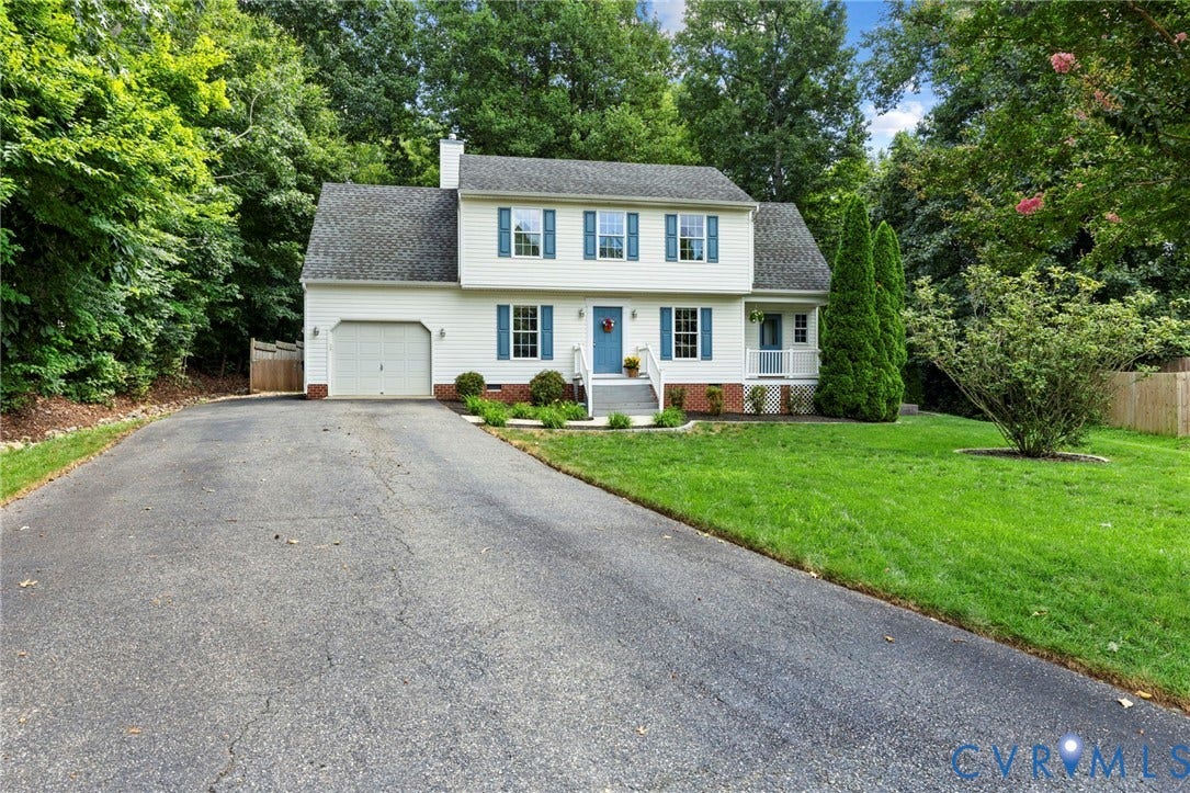 6201 Cameron Bay Terrace, Cameron Bay, Midlothian, VA 23112 Two-story residence featuring white siding, blue window shutters, an attached garage, a front porch with white columns, and a paved driveway
