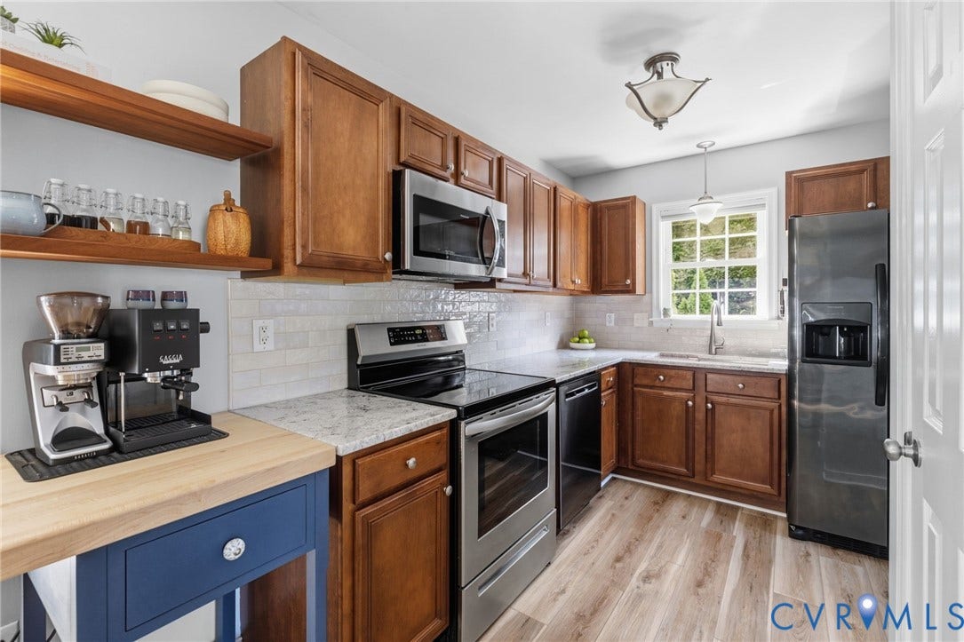 6201 Cameron Bay Terrace, Cameron Bay, Midlothian, VA 23112 Kitchen featuring wood-finish flooring, wood cabinetry, stone countertops, a subway tile backsplash, and stainless steel appliances
