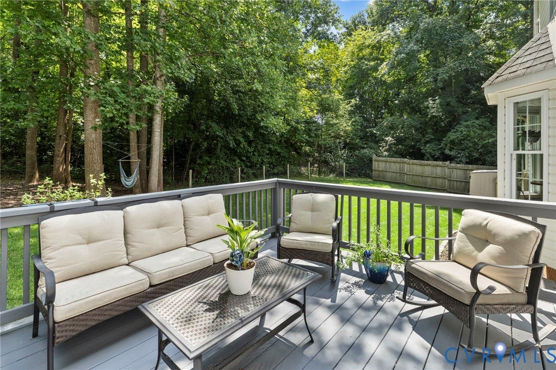 6201 Cameron Bay Terrace, Cameron Bay, Midlothian, VA 23112 Expansive wooden deck with a gray finish, featuring a surrounding railing