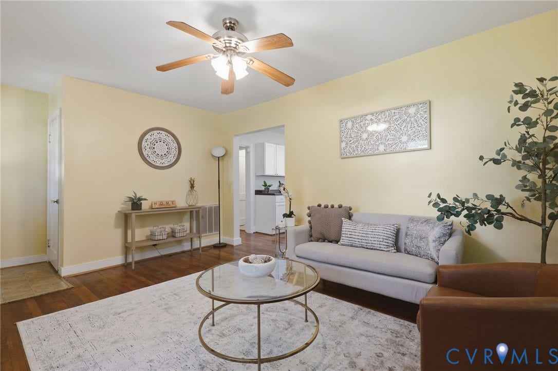 9925 S Wagstaff Circle, One Acre Lot, North Chesterfield, VA 23236 Ceiling fan. Hardwood floors. Door to upstairs bedrooms on far left.