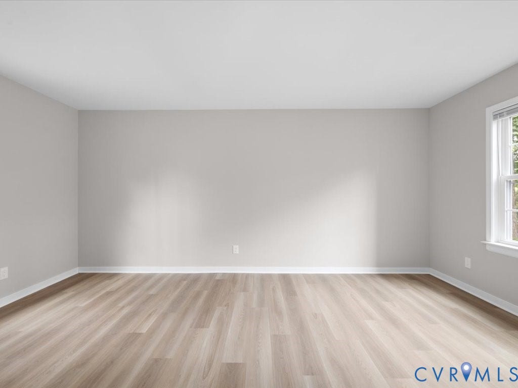 3313 New Found Lane, Chester, VA 23831 Light-toned wood-finish flooring, neutral wall paint, and a white-trimmed window