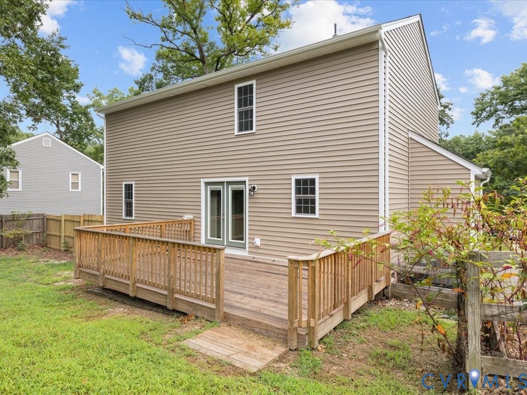 3313 New Found Lane, Chester, VA 23831 Rear exterior with tan siding and white trim