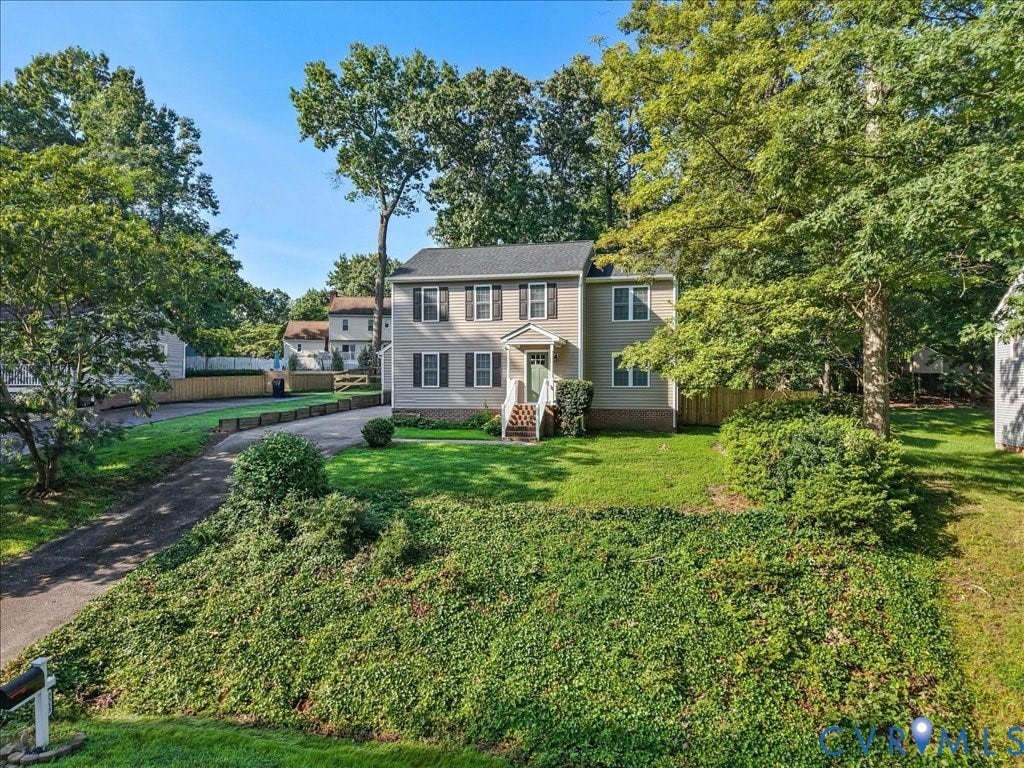 3313 New Found Lane, Chester, VA 23831 Two-story residence featuring a gray facade, white trim, and dark shutters