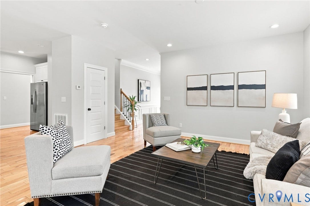 Generously sized family room with beautiful hardwood floors and plenty of flexibility for multiple seating arrangements.