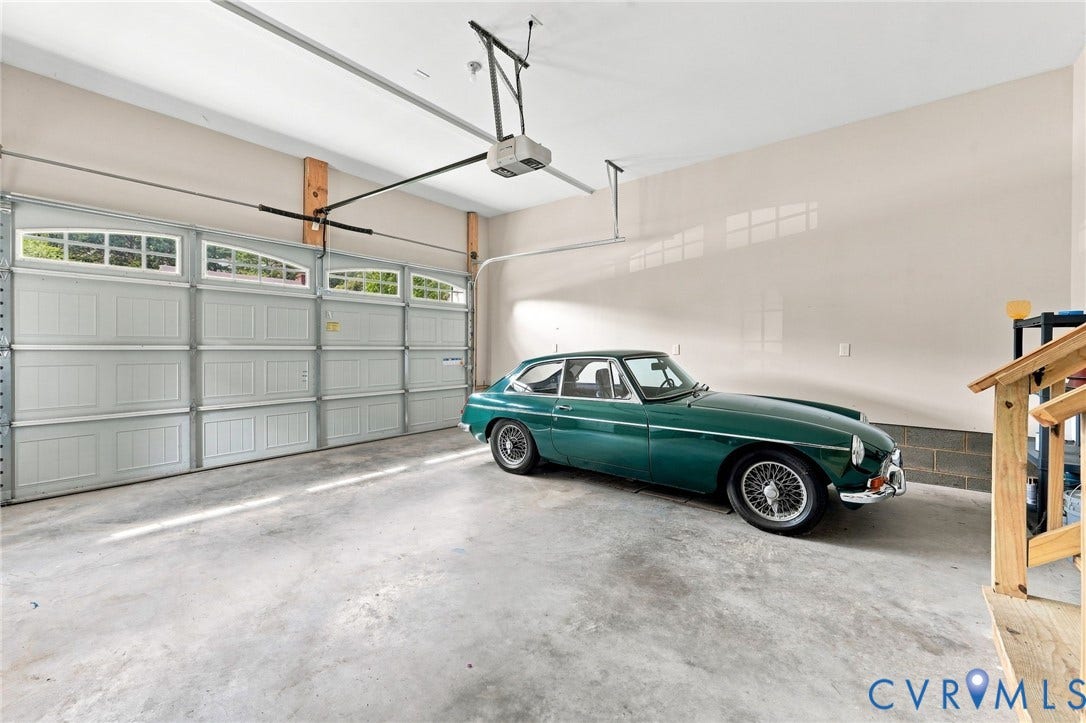 Attached two-car garage provides ample parking and additional storage space.