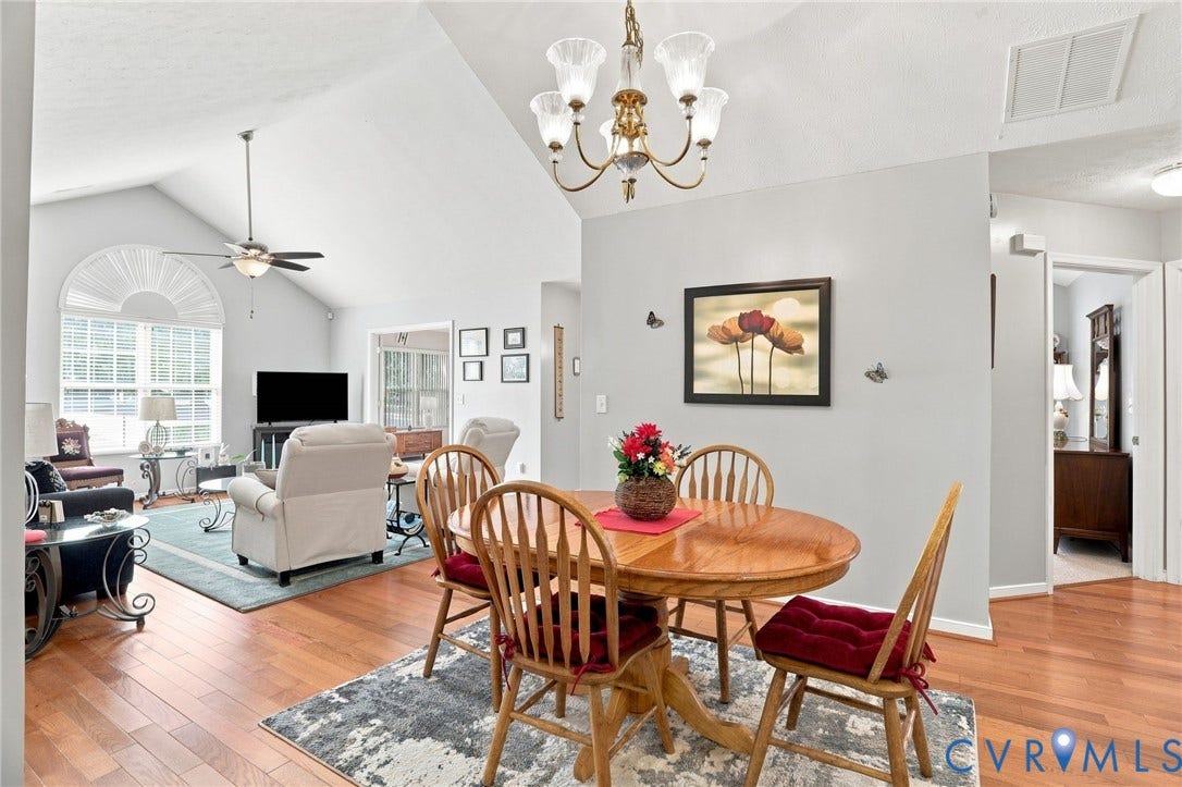 7230 Norwood Pond Court, Midlothian, VA 23112 Vaulted ceilings, wood-finish flooring, and arched window