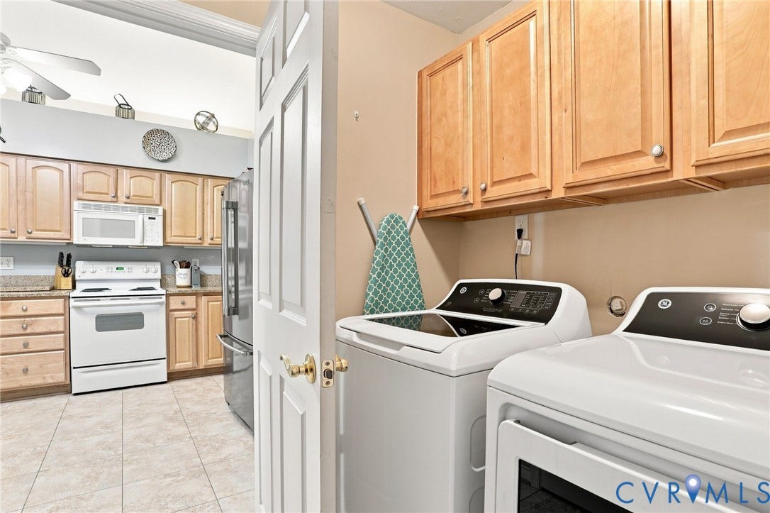 7230 Norwood Pond Court, Midlothian, VA 23112 Kitchen featuring light wood cabinetry, white appliances, and tiled flooring