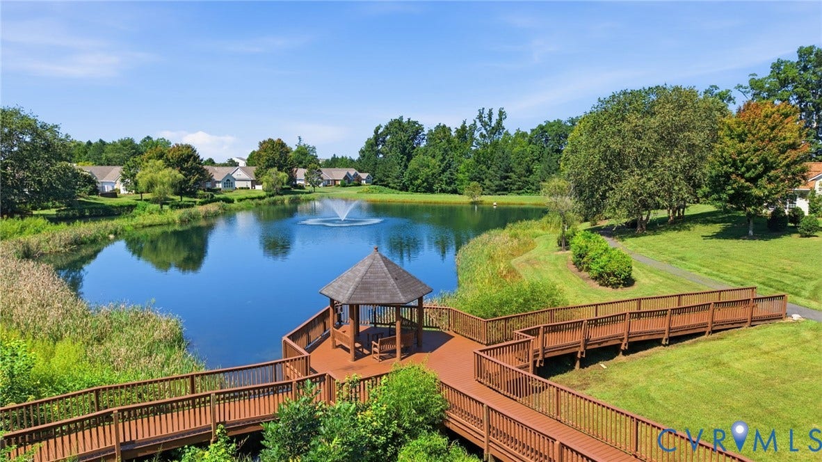 7230 Norwood Pond Court, Midlothian, VA 23112 Expansive body of water with a central fountain