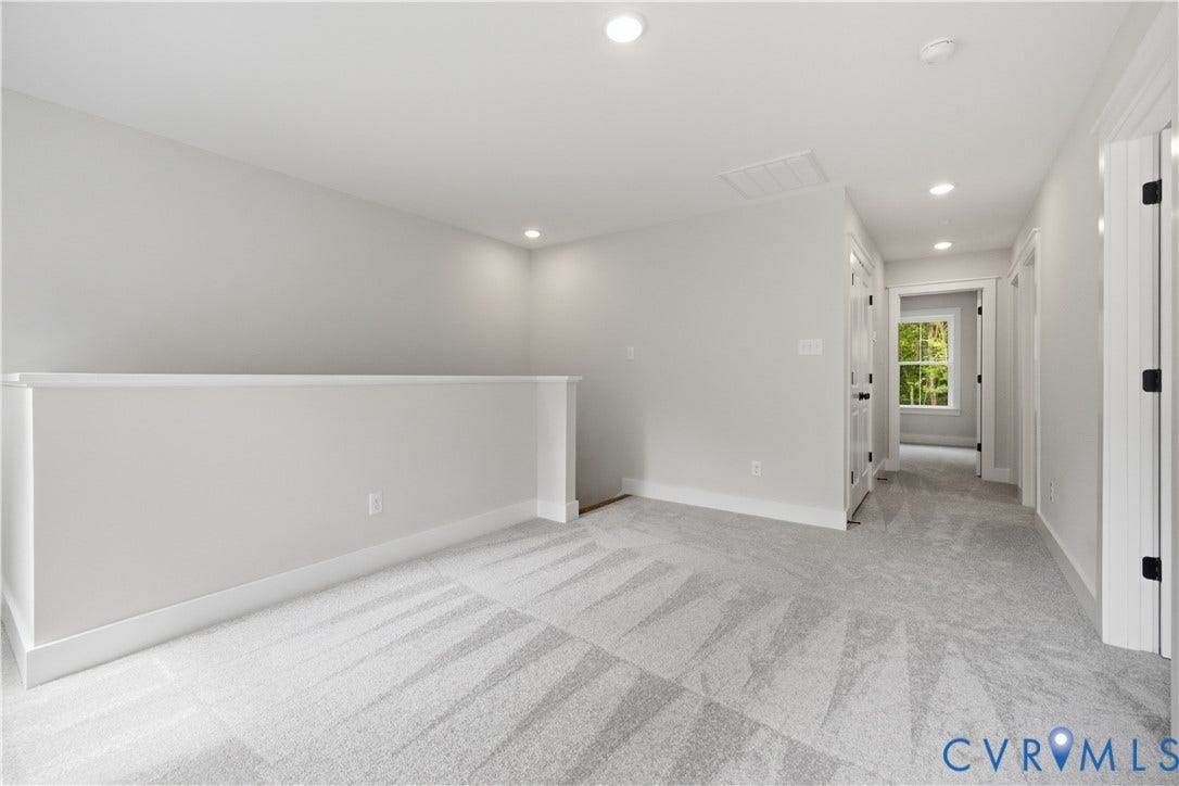3120 Lake Stone (lot 22) Terrace, Maple Grove, Powhatan, VA 23139 View to bedroom hall with full bath. Photo of for-sale home, staged
