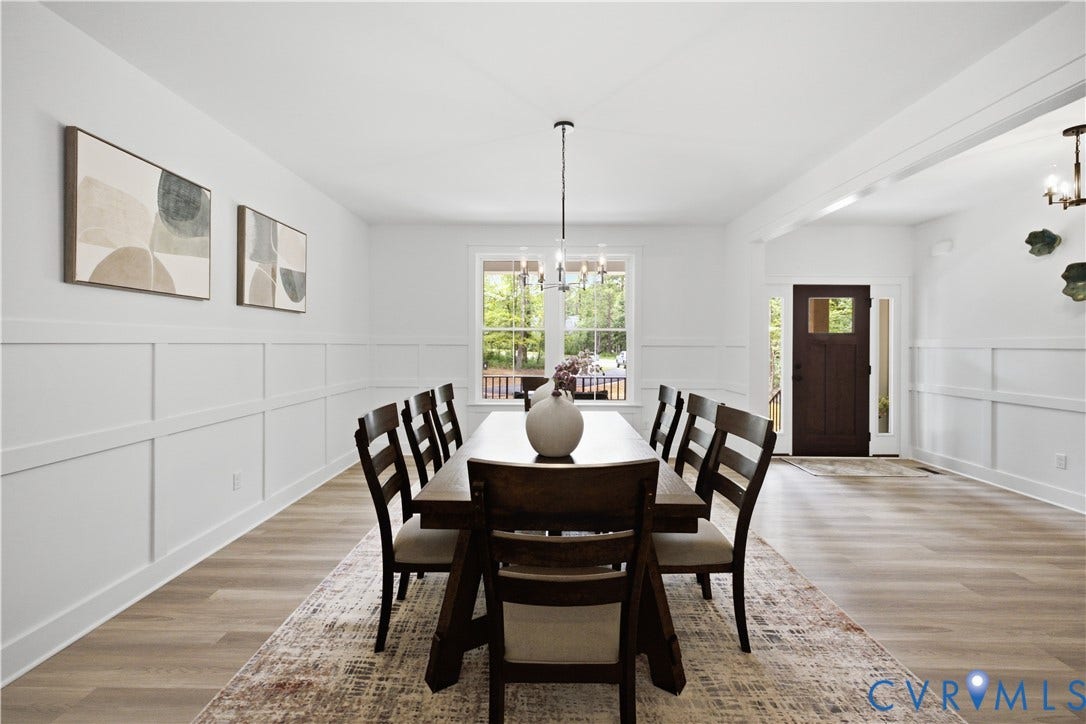Entry. View from Kitchen/Family Room towards foyer. Photo of home for sale, staged.