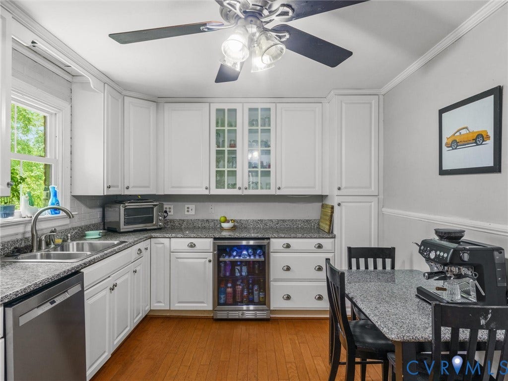 White cabinetry with glass-front accents