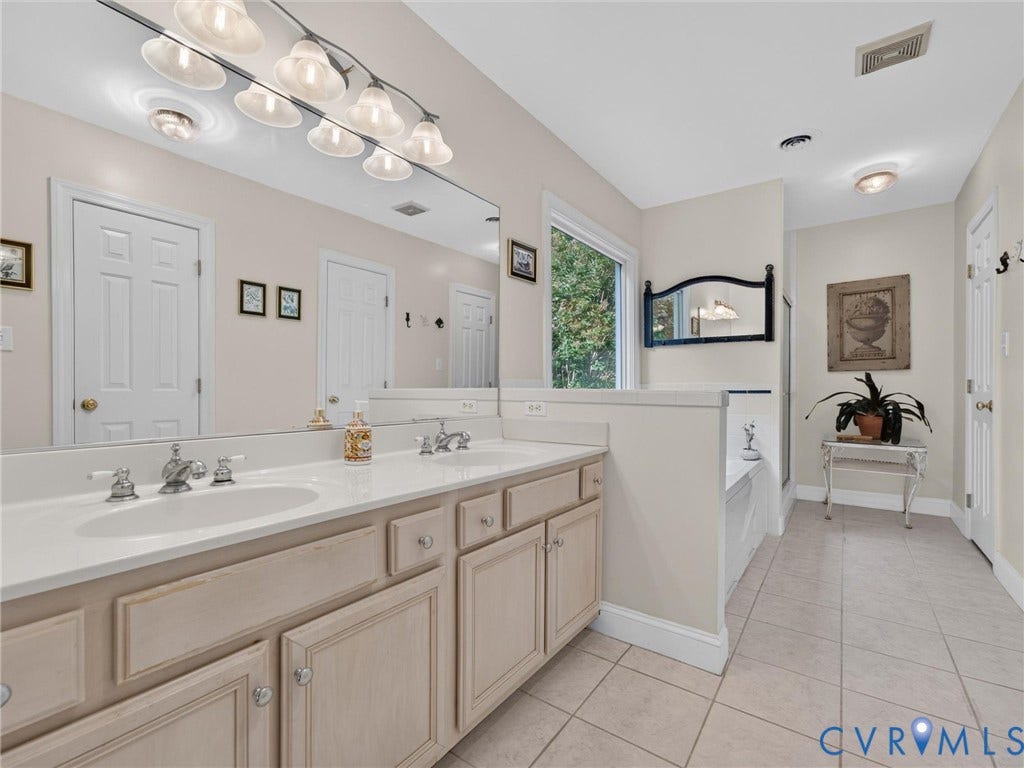 14509 Augusta Lane, Ashland, VA 23005 Primary Bath with tile floor and double vanities!