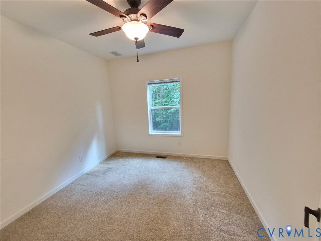 2575 Log Cabin Road, Maidens, VA 23102 Empty without staging 3rd bedroom. Neutral carpeting and light-toned walls