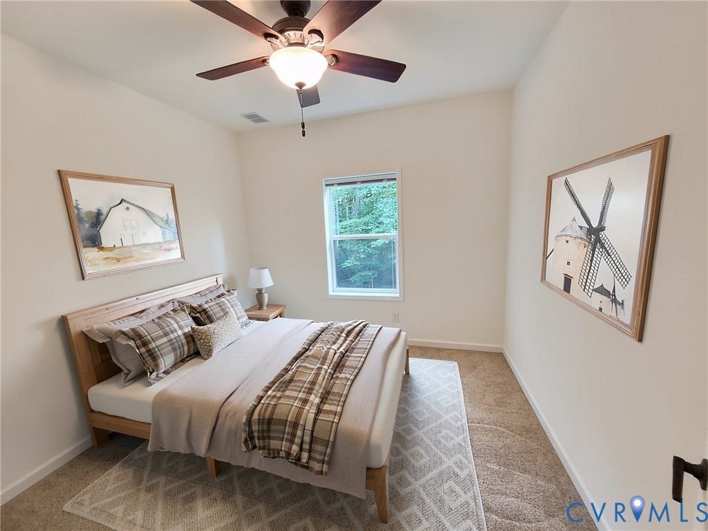 2575 Log Cabin Road, Maidens, VA 23102 Virtually staged 3rd bedroom. Recessed window, wood-finish ceiling fan, recessed lighting, and carpet flooring
