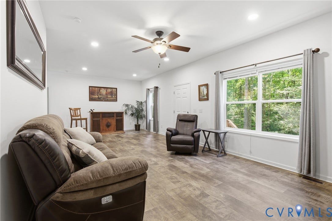 2575 Log Cabin Road, Maidens, VA 23102 Spacious room featuring wood-finish flooring, recessed lighting, and a ceiling fan