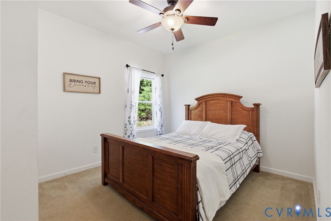 2575 Log Cabin Road, Maidens, VA 23102 Carpeted room featuring a ceiling fan with integrated lighting