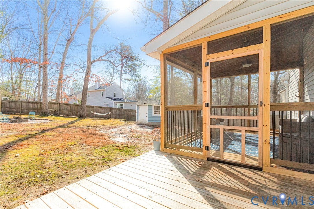 Screened porch leading to the deck.
