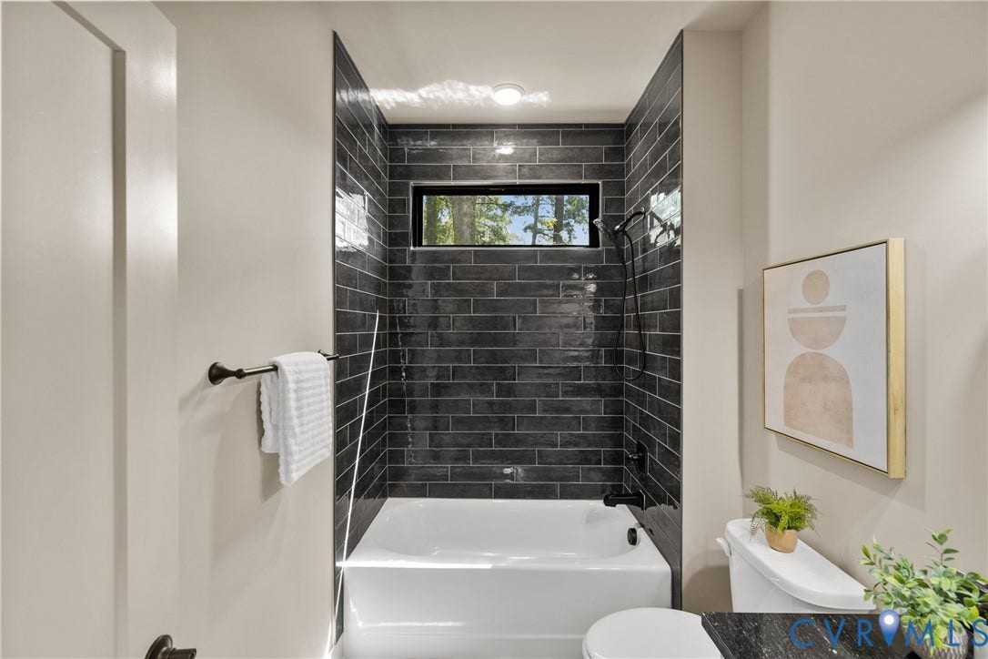 Full Bathroom Servicing Bedroom Four