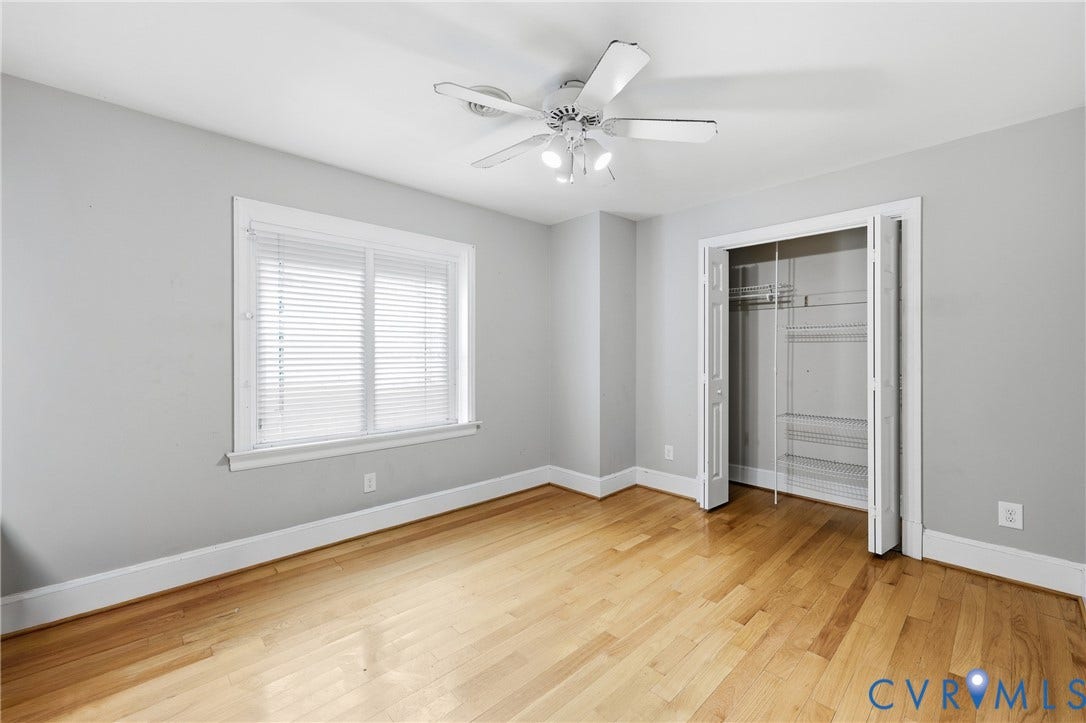 505 Martineau Drive, Chesterfield, VA 23836 Hardwood flooring, ceiling fan with integrated lighting, white window blinds, bi-fold closet doors, and wire shelving
