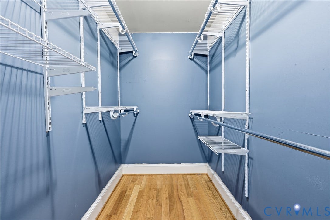 505 Martineau Drive, Chesterfield, VA 23836 Hardwood flooring with white baseboards and adjustable wire shelving system