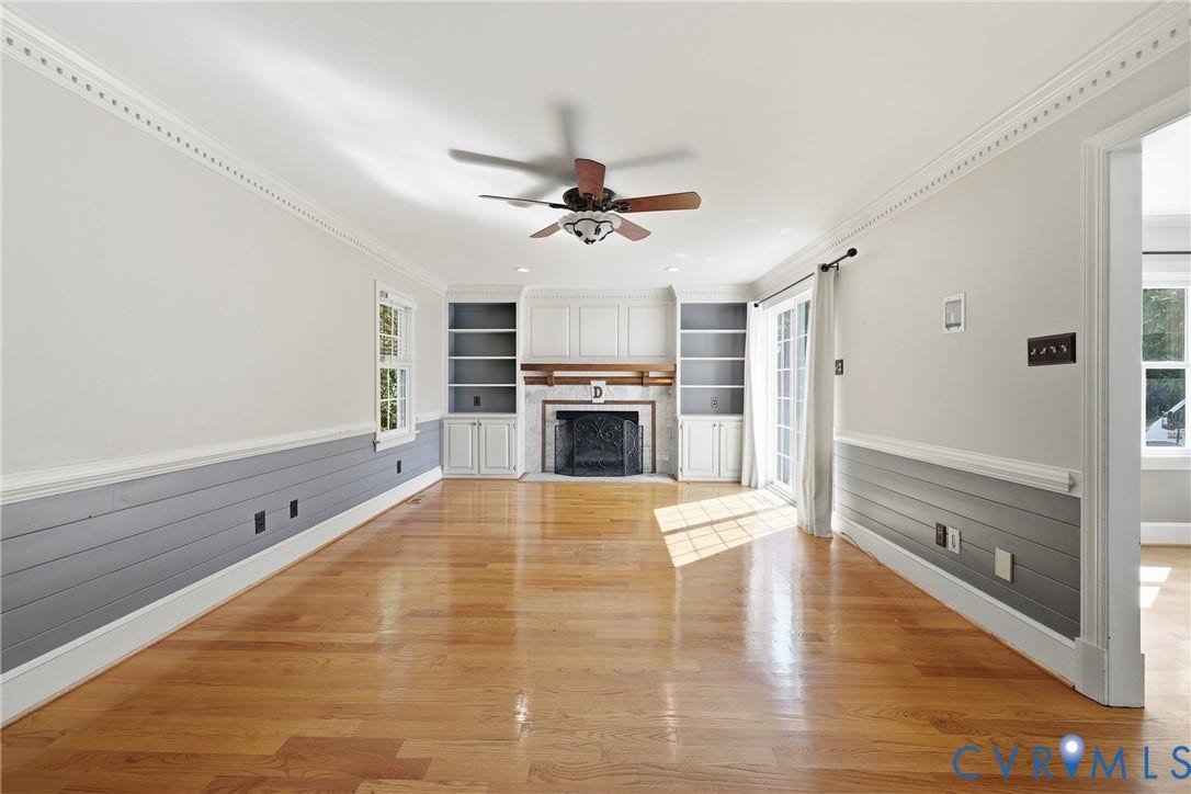 505 Martineau Drive, Chesterfield, VA 23836 Hardwood flooring throughout, built-in shelving, fireplace with mantel, crown molding, and a ceiling fan
