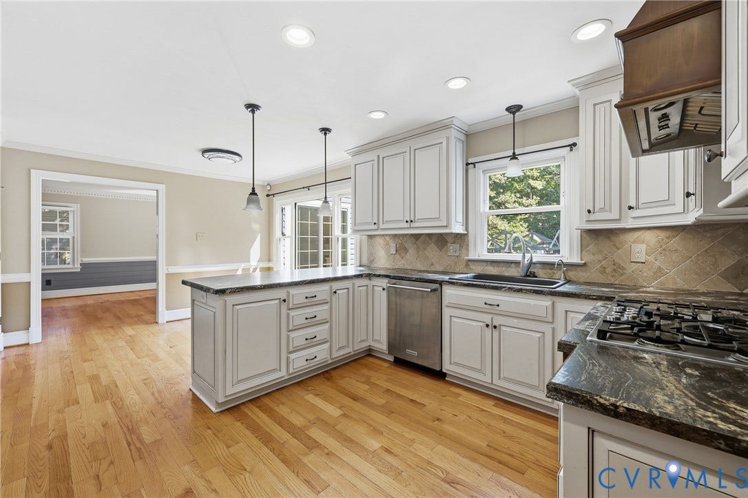 505 Martineau Drive, Chesterfield, VA 23836 Kitchen featuring light cabinetry, dark countertops, a built-in gas cooktop, and hardwood flooring
