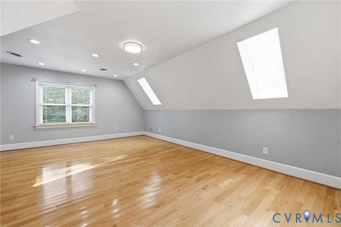 505 Martineau Drive, Chesterfield, VA 23836 Hardwood flooring, recessed lighting, ceiling-mounted light fixture, skylight, and white trim