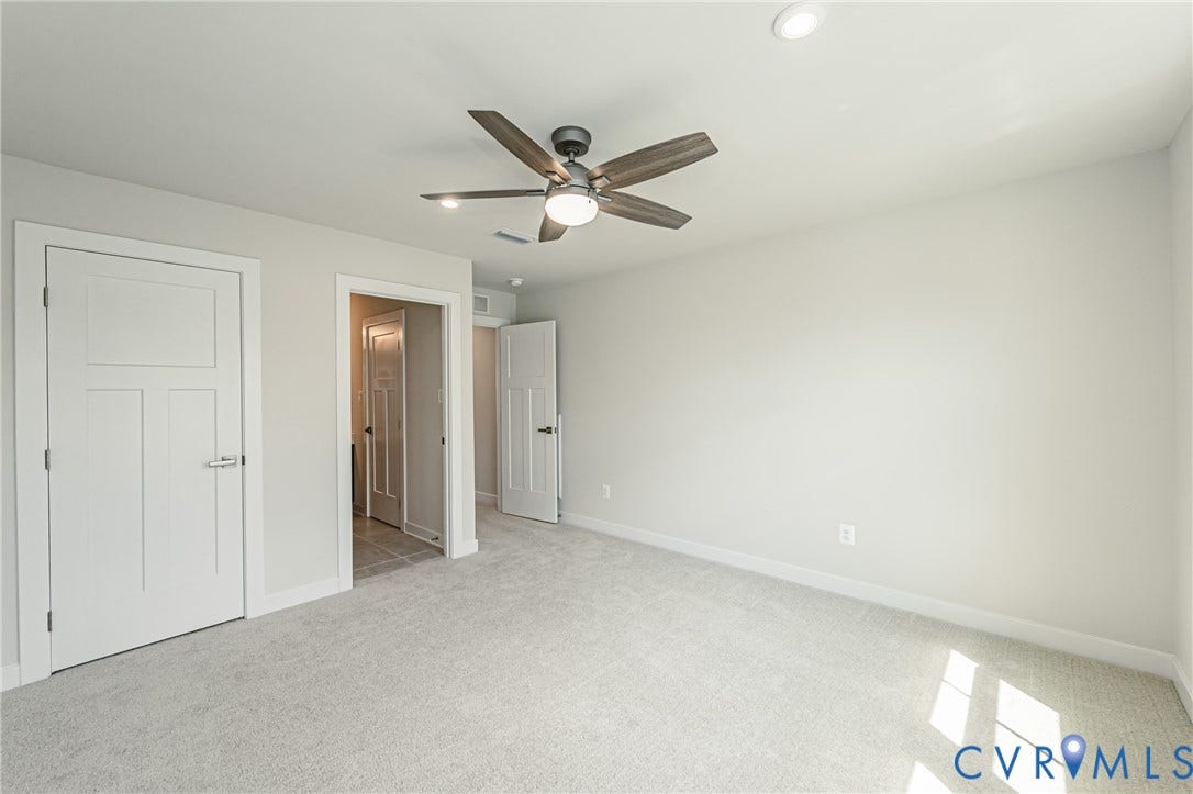 7683 Autumn Leaves Lane, Estates The Groves At New Kent, New Kent, VA 23124 Plush carpet flooring, recessed ceiling lighting, and a ceiling fan with light fixture
