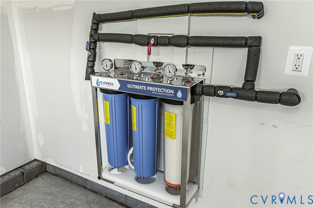 7683 Autumn Leaves Lane, Estates The Groves At New Kent, New Kent, VA 23124 Integrated whole-house water filtration system featuring multiple filters and pressure gauges