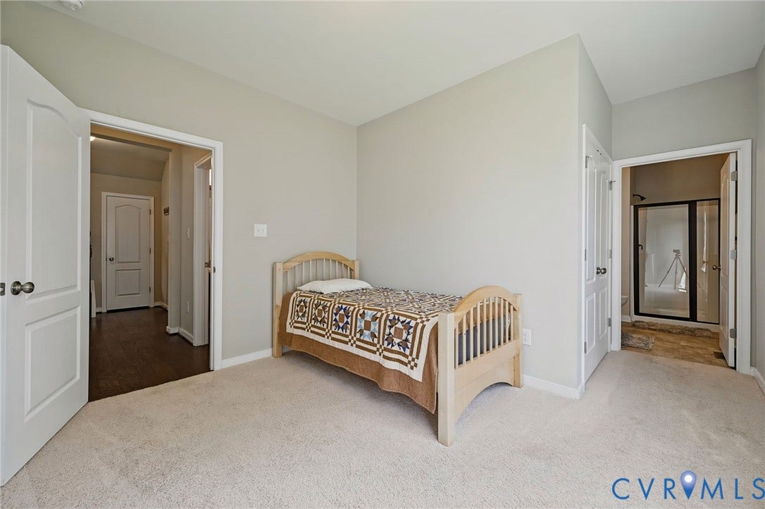 Neutral paint colors and light-toned carpeting