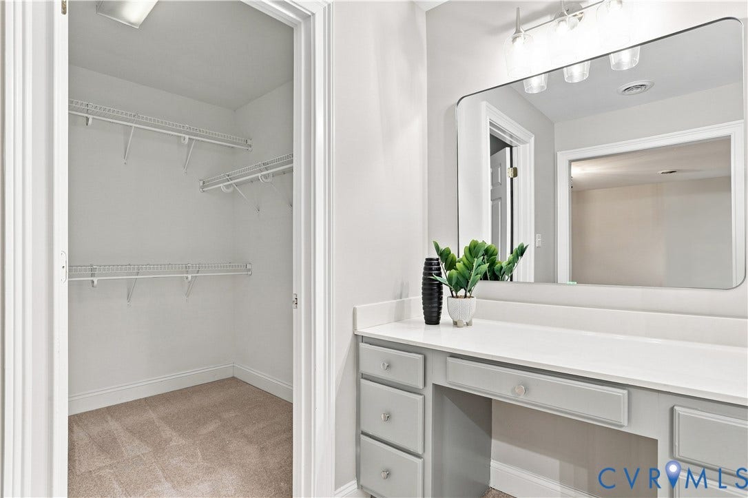 3231 Queens Grant Drive, Queens Grant, Midlothian, VA 23113 Vanity area outside of bathroom. View of walk in closet.