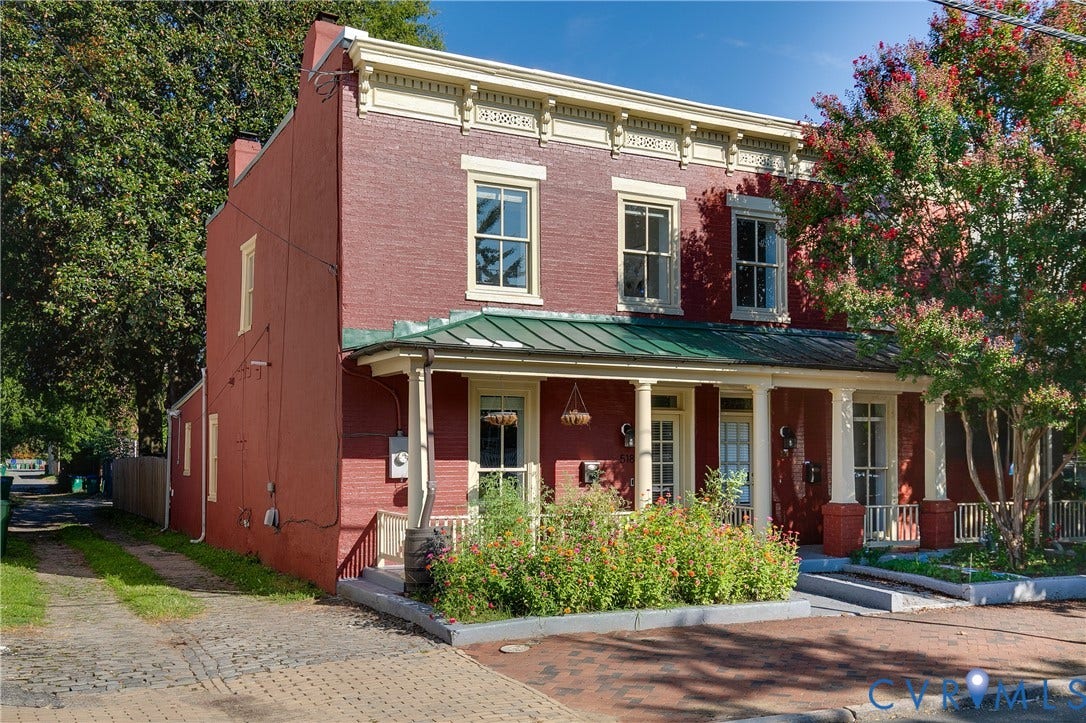 518 N 1st Street, Jackson Ward, Richmond, VA 23219 Brick exterior with decorative cornice, covered porch, and white window trim