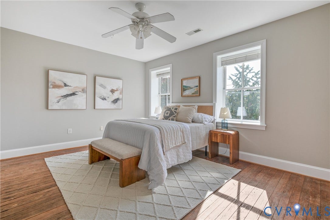 518 N 1st Street, Jackson Ward, Richmond, VA 23219 Wood-finish flooring, white trim, and light gray walls