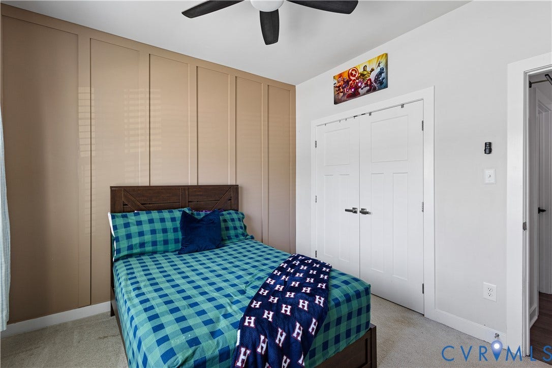 4818 Stavely Road, Womack Green, Chester, VA 23831 Wall paneling detail with neutral tones and carpeting