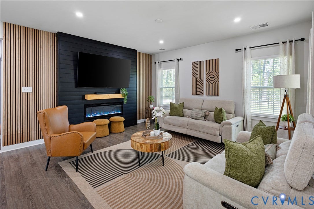 4818 Stavely Road, Womack Green, Chester, VA 23831 Accent wall with electric insert fireplace