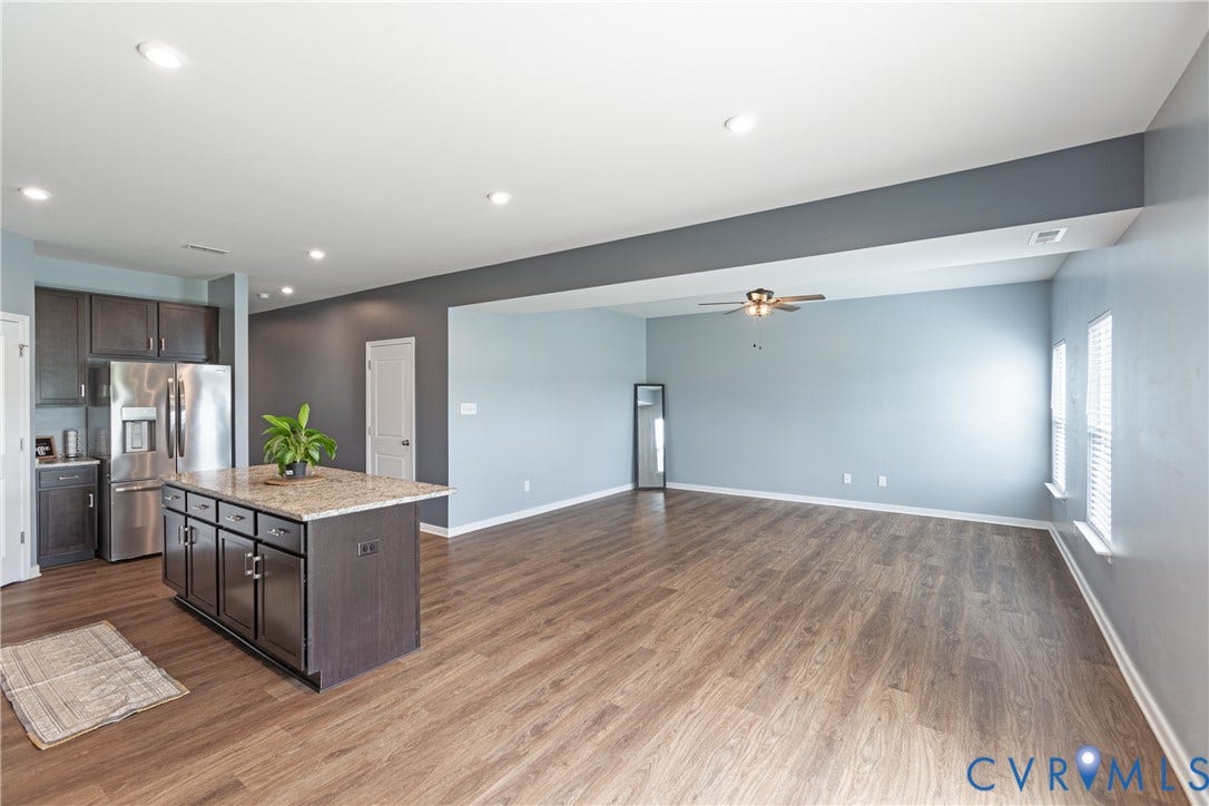 11419 Dunmore Mill Court, Chester, VA 23831 Open-concept living area featuring wood-finish flooring, recessed lighting, and a ceiling fan