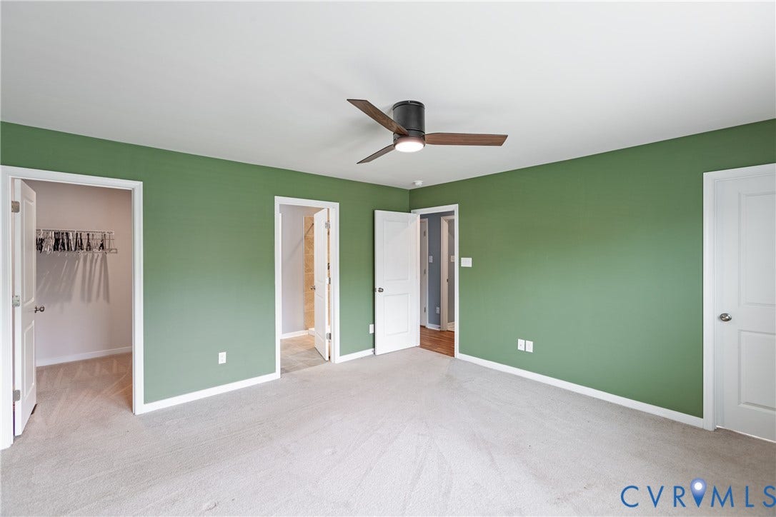 11419 Dunmore Mill Court, Chester, VA 23831 Light-toned carpeting, ceiling-mounted fan fixture, and multiple doorways