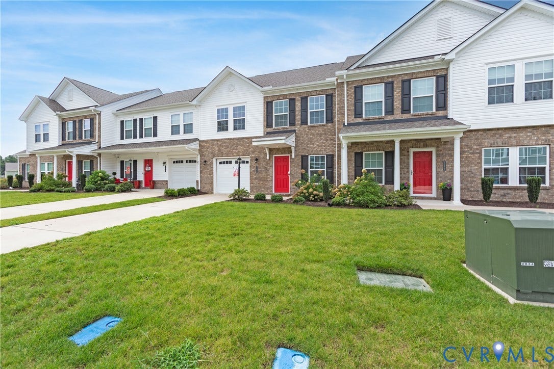 11419 Dunmore Mill Court, Chester, VA 23831 Brick and siding exterior with black window shutters and white trim