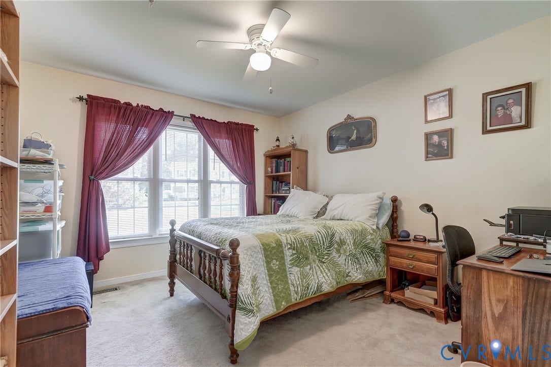 4229 Greenbriar Drive, Chester, VA 23831 Ceiling fan fixture, wall-to-wall carpeting, and double windows with ample natural light